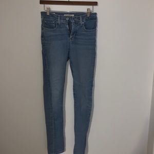 Blue skinny Levi’s jeans